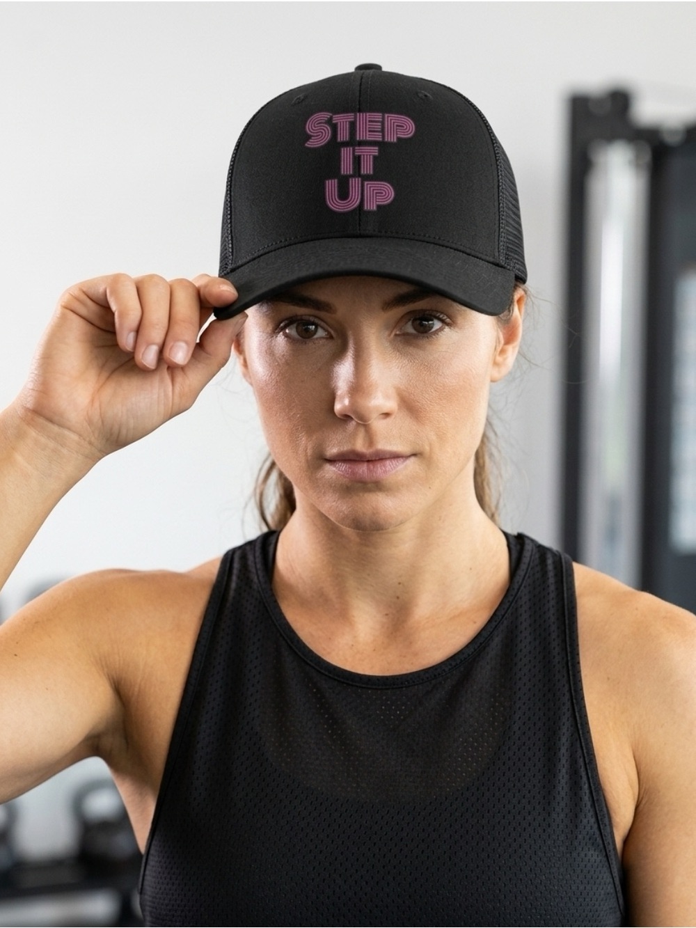 The Classic Black Trucker Hat with Yellow Logo Tag